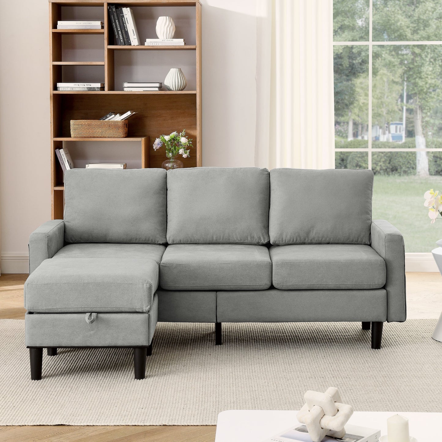 Divano componibile imbottito con pouf