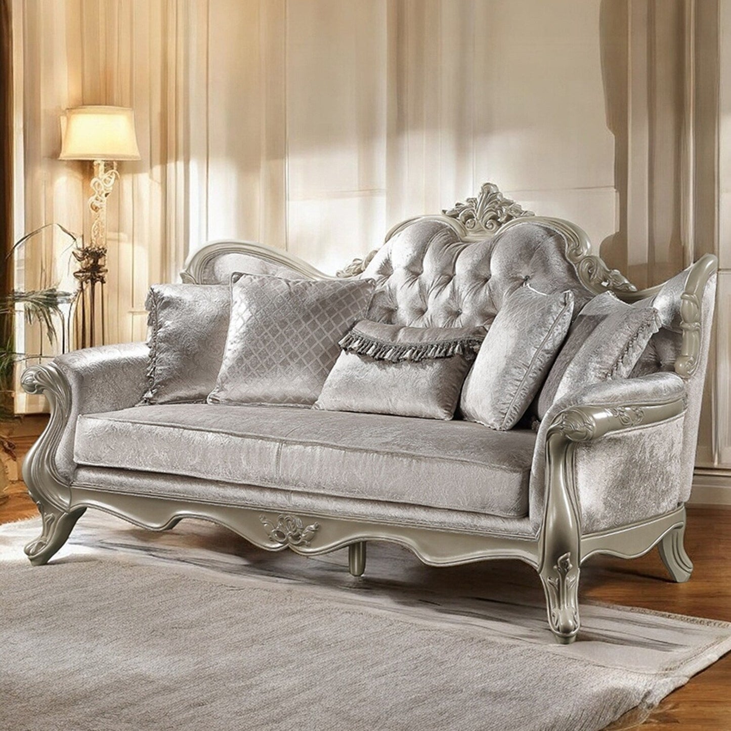 Divano imbottito con schienale capitonné in beige e champagne