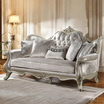 Divano imbottito con schienale capitonné in beige e champagne