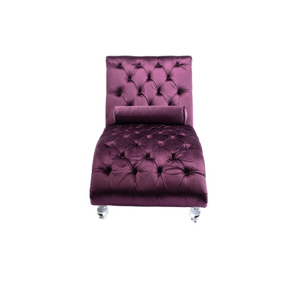 Poltrona reclinabile ergonomica a forma di S con cuscino, finiture con borchie e gambe in acrilico per uso interno.
