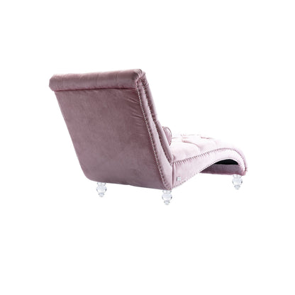 Poltrona reclinabile ergonomica a forma di S con cuscino, finiture con borchie e gambe in acrilico per uso interno.