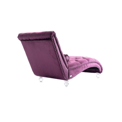 Poltrona reclinabile ergonomica a forma di S con cuscino, finiture con borchie e gambe in acrilico per uso interno.
