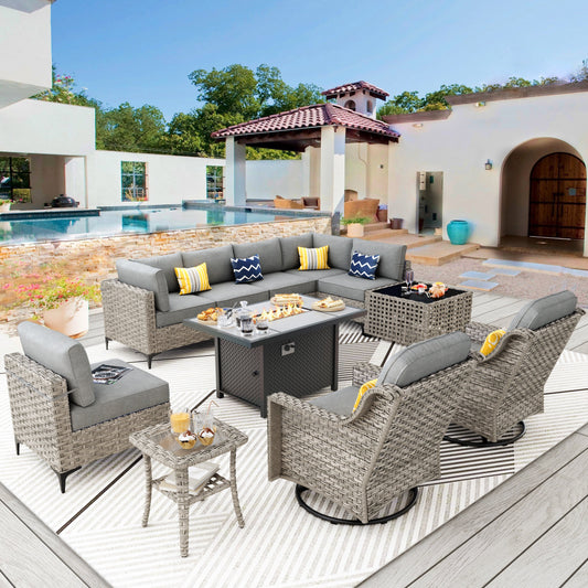 Set di mobili da giardino in rattan e vimini XIZZI da 11 pezzi con tavolo con braciere